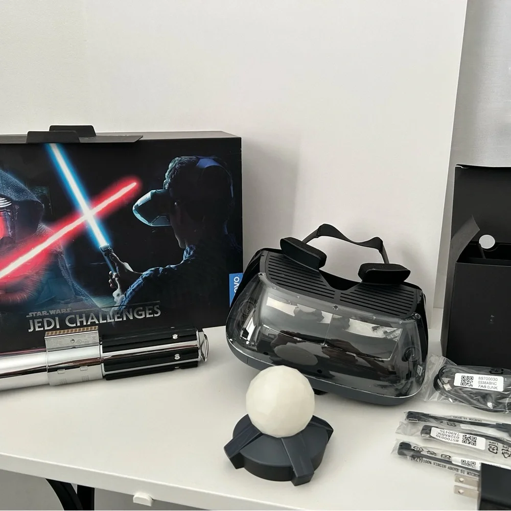 Lenovo Star Wars Jedi Challenges AR headset and light saber